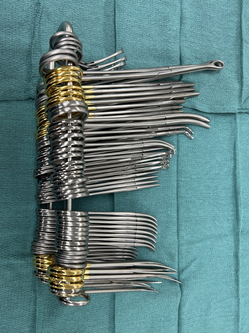 A picture containing indoor, weapon, green, knife
Description automatically generated